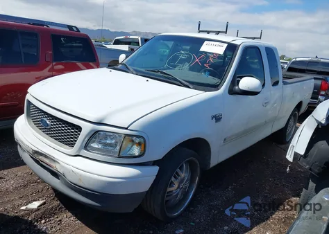 2001 Ford F-150 Lariat/Xl/Xlt z USA, uszkodzony, nr VIN 1FTRX17L31NA79032